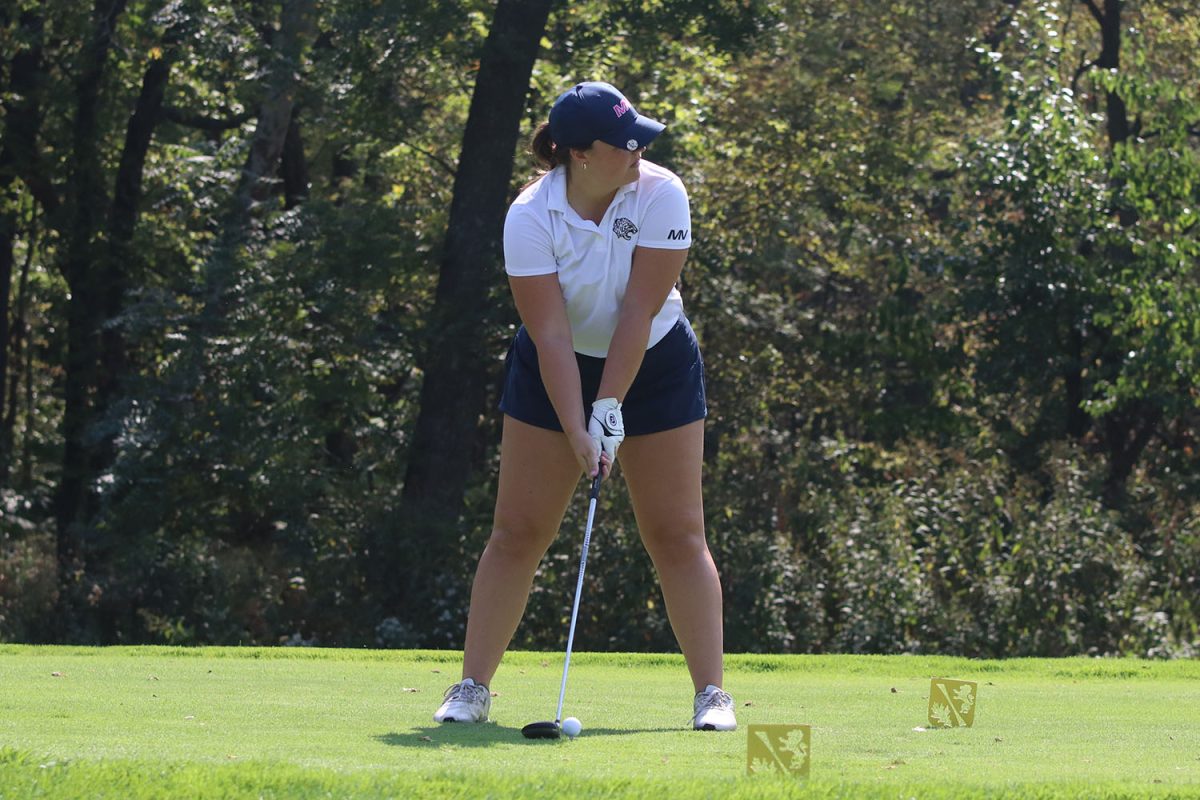  With her club in hand, senior Kathryn Yockey gets ready to hit the ball.

